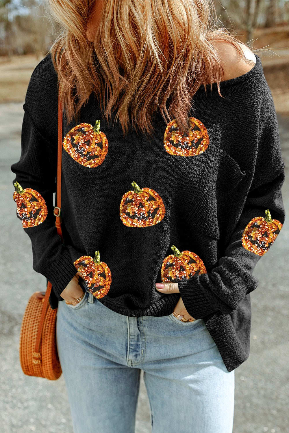 Blusa de punto de manga larga con cuello redondo y calabaza