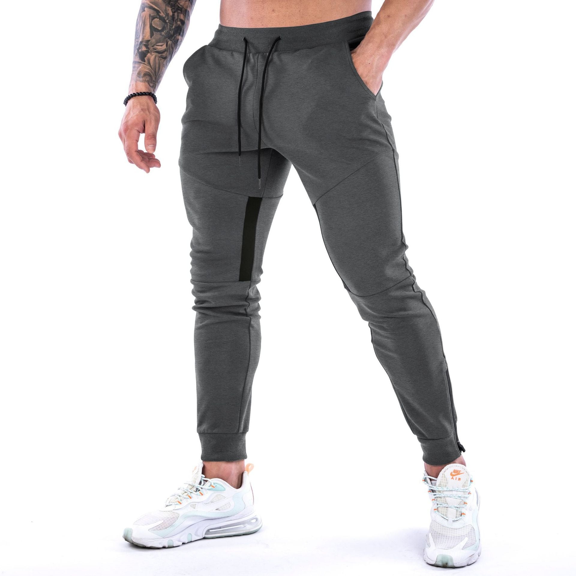 Pantalones deportivos nuevos Muscle Pantalones de fitness para hombre Leggings de entrenamiento 