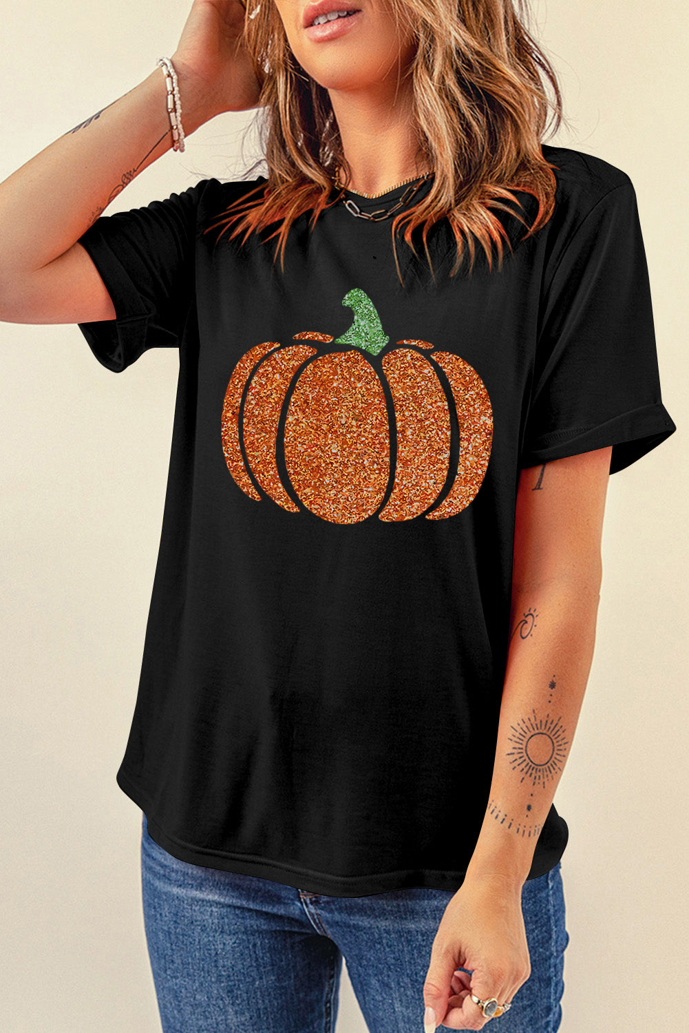 Camiseta de manga corta con cuello redondo y calabaza con purpurina