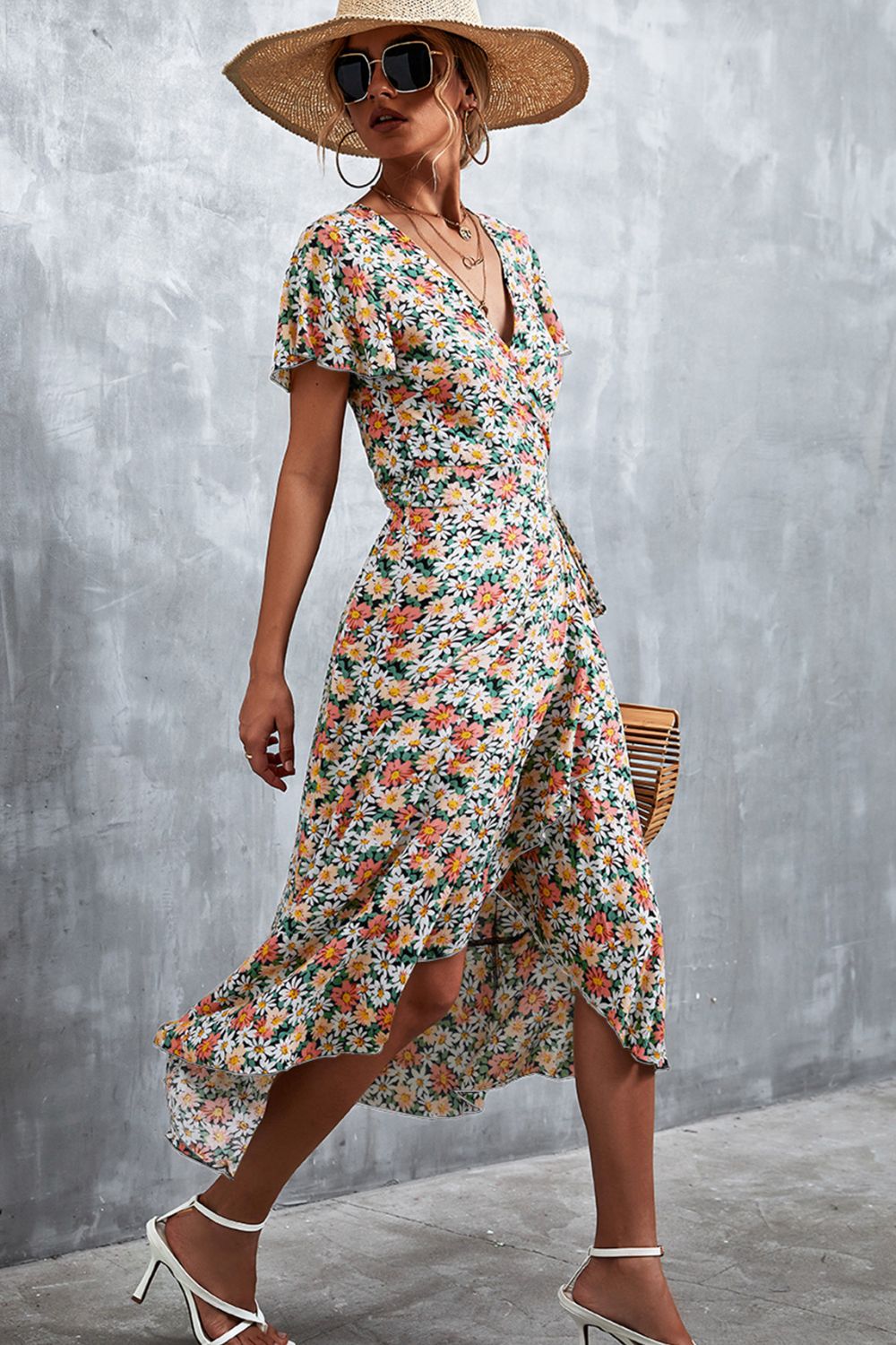 Vestido midi con cuello cruzado y estampado floral