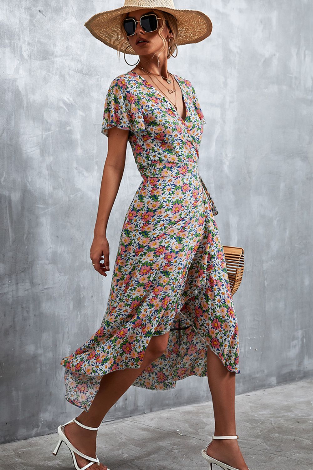 Vestido midi con cuello cruzado y estampado floral