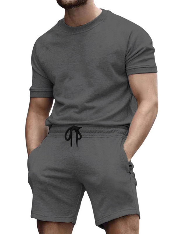 Nuevo traje deportivo informal de manga corta y pantalón corto de color liso para hombre 