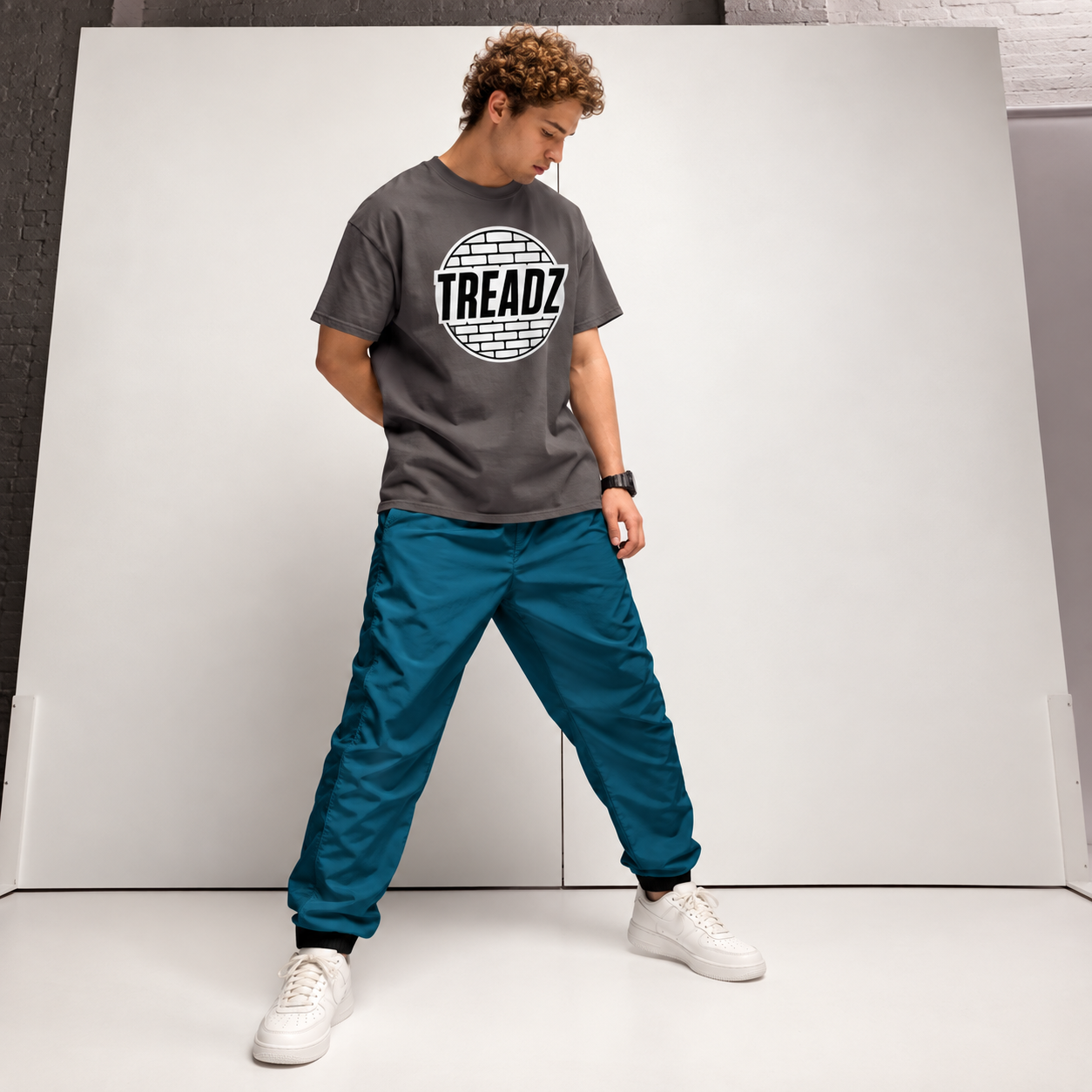 Image Title: TREADZ Deep Current Unisex Track Pants TREADZ Unisex Track Pants Deep Current teal pants with TREADZ logo shirt